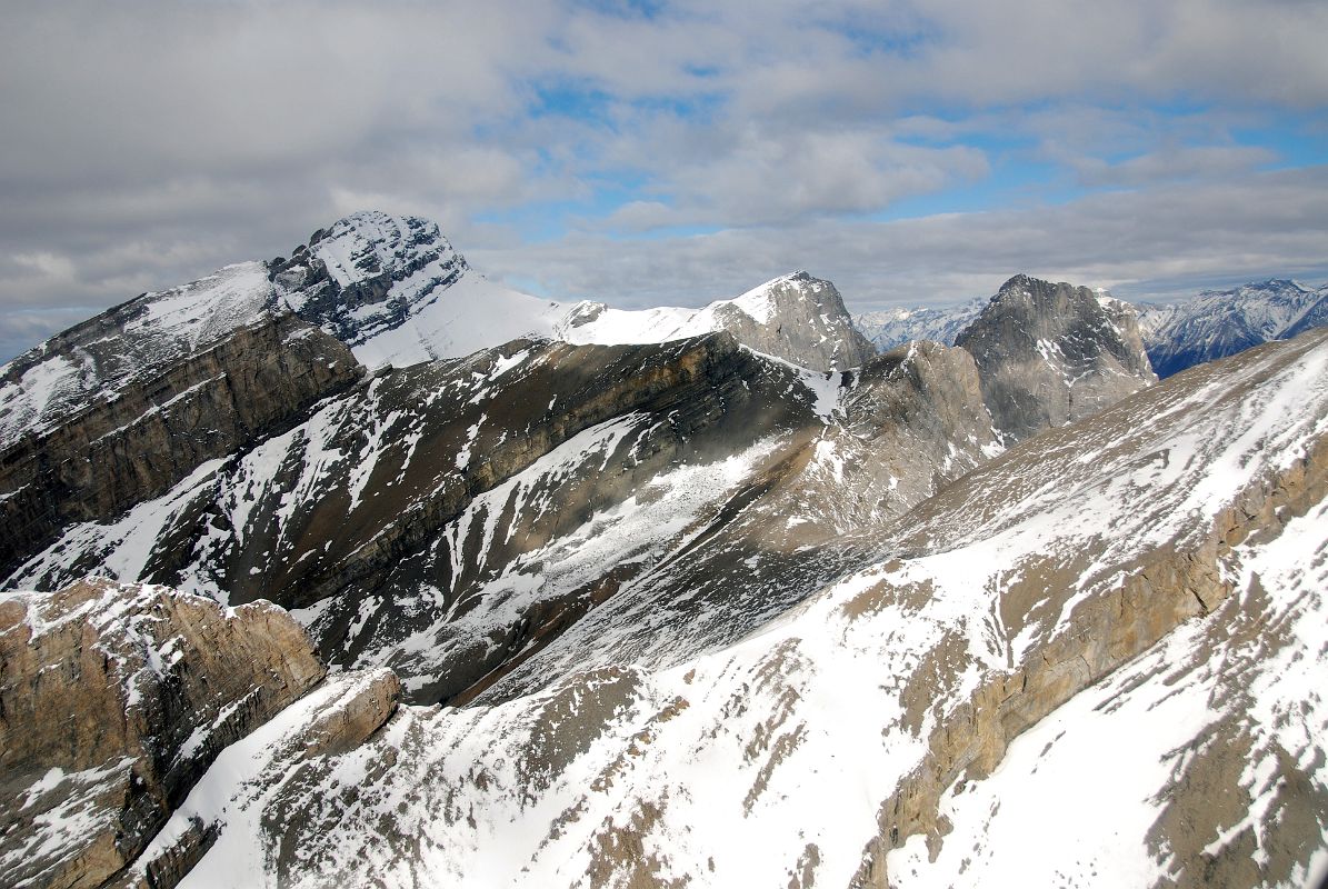 12 The Three Sisters Faith Peak, Hope Peak and Charity Peak, The Rimwall From Helicopter Between Canmore And Mount Assiniboine In Winter